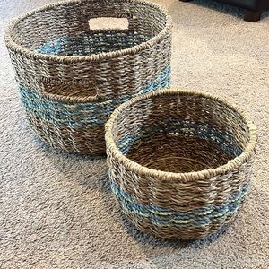 Set of two wicker baskets from Target. Tan, light green, light blue.